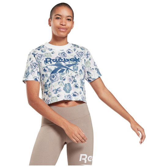 Reebok Γυναικεία κοντομάνικη μπλούζα RI Floral Crop Tee Reebok Γυναικεία κοντομάνικη μπλούζα RI Floral Crop Tee